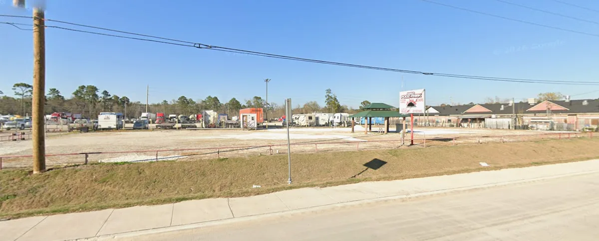 FM 1960 street view showing commercial lot and adjacent businesses