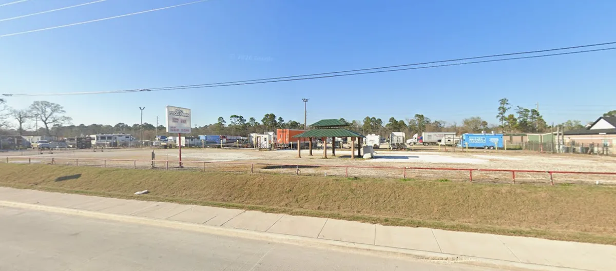Commercial yard for lease on FM 1960 East Humble TX — wide frontage view